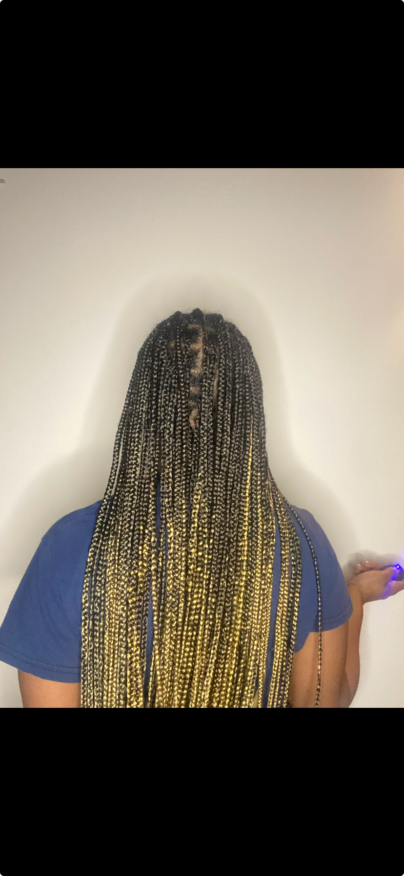 Knotless Braids with gold highlights